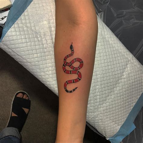 gucci snake tattoo on finger|snake shoulder tattoos.